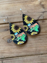 Load image into Gallery viewer, Faux leather dangle earrings, sunflower with Texas shape, black background