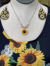 Load image into Gallery viewer, Faux leather dangle earrings, sunflower with black background