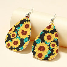 Load image into Gallery viewer, Faux leather dangle earrings, sunflower with green leaves