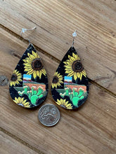 Load image into Gallery viewer, Faux leather dangle earrings, sunflower with Texas shape, black background