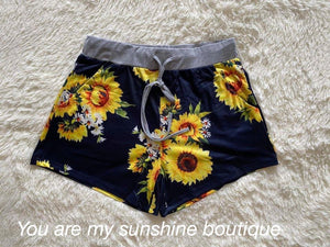 Sunflower shorts with navy blue background - You Are My Sunshine Boutique LLC